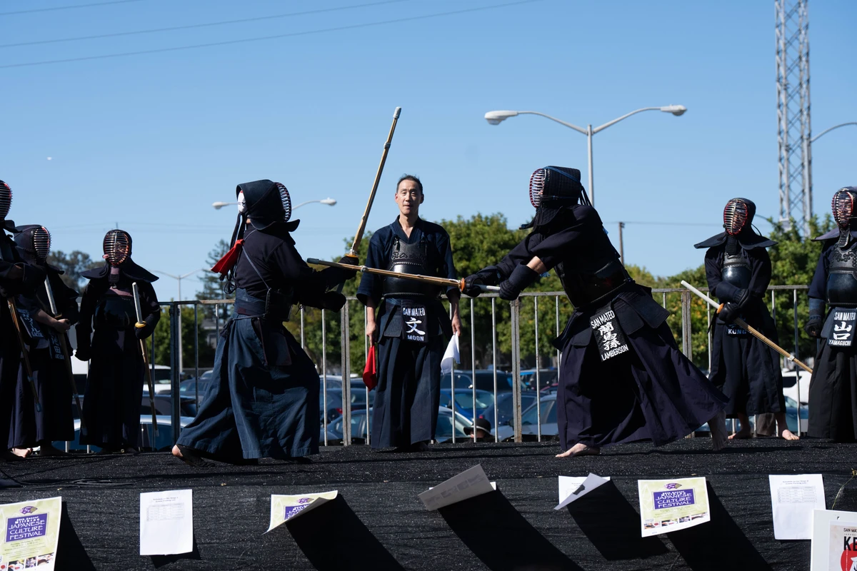 Two students sparring with each other, one clearly got a point