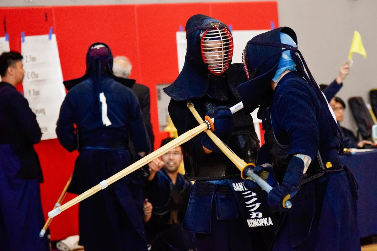 Two competitors clash during a match